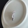 Silver brooch with a hand holding rose - pinBrooches