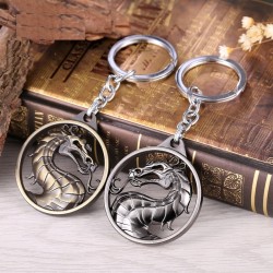 Round metal keychain with dragonKeyrings