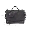 Vintage nubuck leather bag with rivets / fur pom pomBags