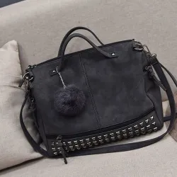 Vintage nubuck leather bag with rivets / fur pom pomBags