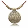 Vintage necklace - round metal pendant - leather ropeNecklaces