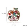 Apple shaped brooch with crystalsBrooches
