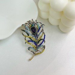 Crystal feather shaped broochBrooches