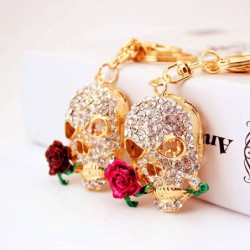 Golden crystal skull with rose - keychainKeyrings