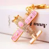 Crystal airplane - gold keychainKeyrings