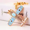 Crystal airplane - gold keychainKeyrings