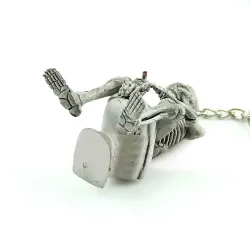 Skeleton sitting on the toilet - rubber keychainKeyrings
