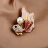 Crystal goldfish with a pearl - elegant broochBrooches