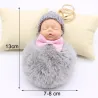Sleeping baby doll - keychainKeyrings