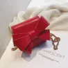 Small elegant bag with bow & chainBags